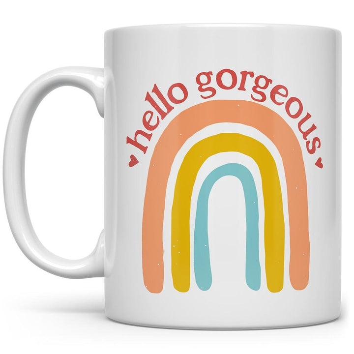 white mug that says Hello Gorgeous with a rainbow on a white background