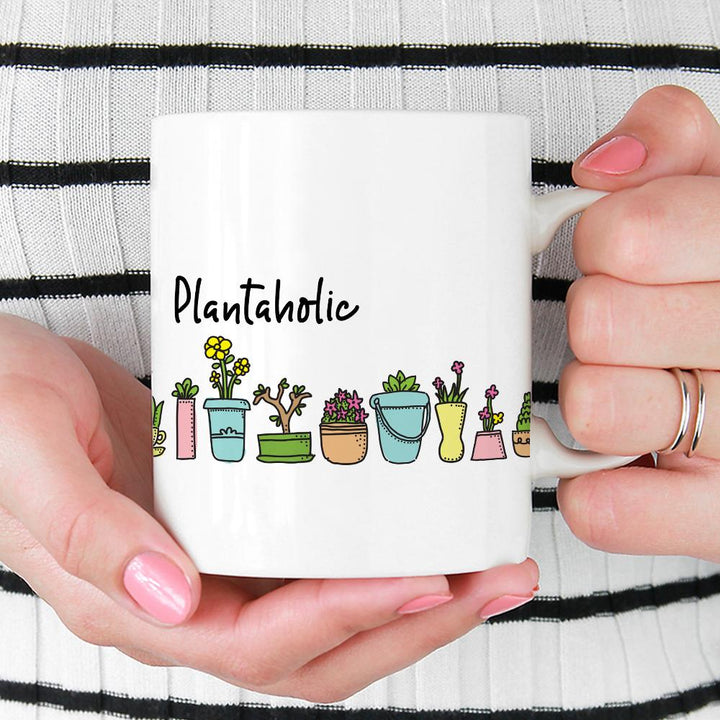 Plantaholic Mug held by hands - Loftipop